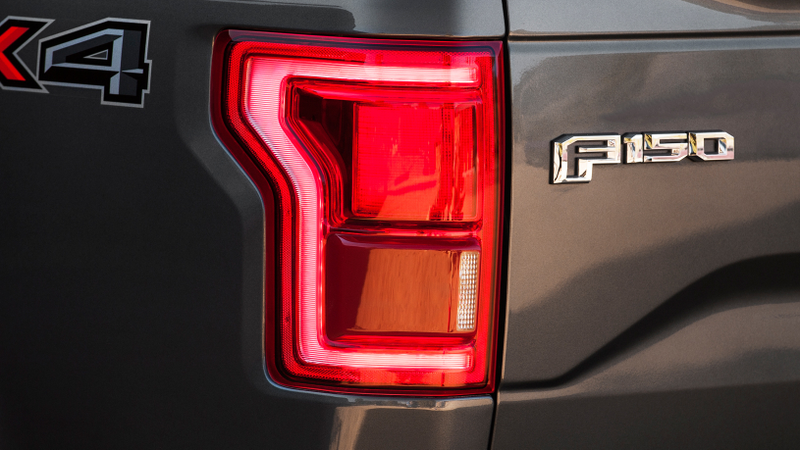 Illustration for article titled Hot take: New F-150 tail lights aren't worth anything to other drivers in heavy rain.
